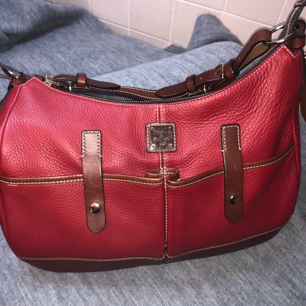 Authentic Dooney & Bourke red  leather purse.